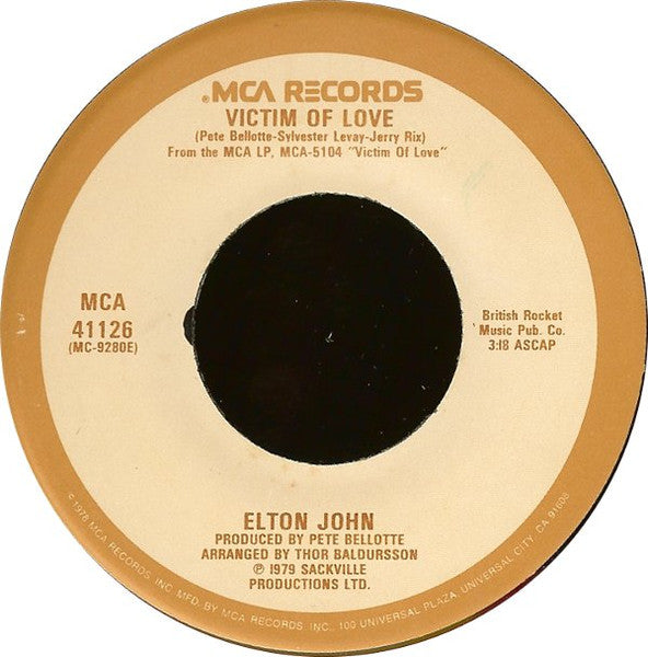 Victim Of Love/ Strangers